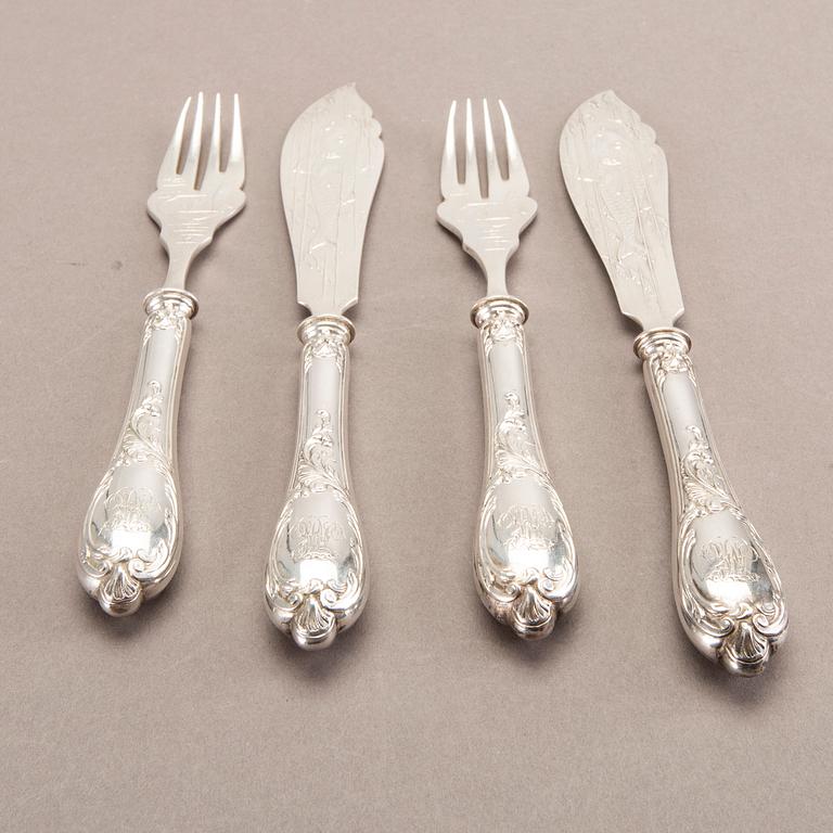 A German 20th century set of 12 fish cutlery low grade silver mark of F W Hespe hamburg early 1900s.