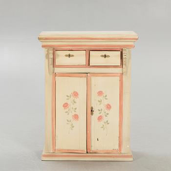 An 18th century painted cabinet.