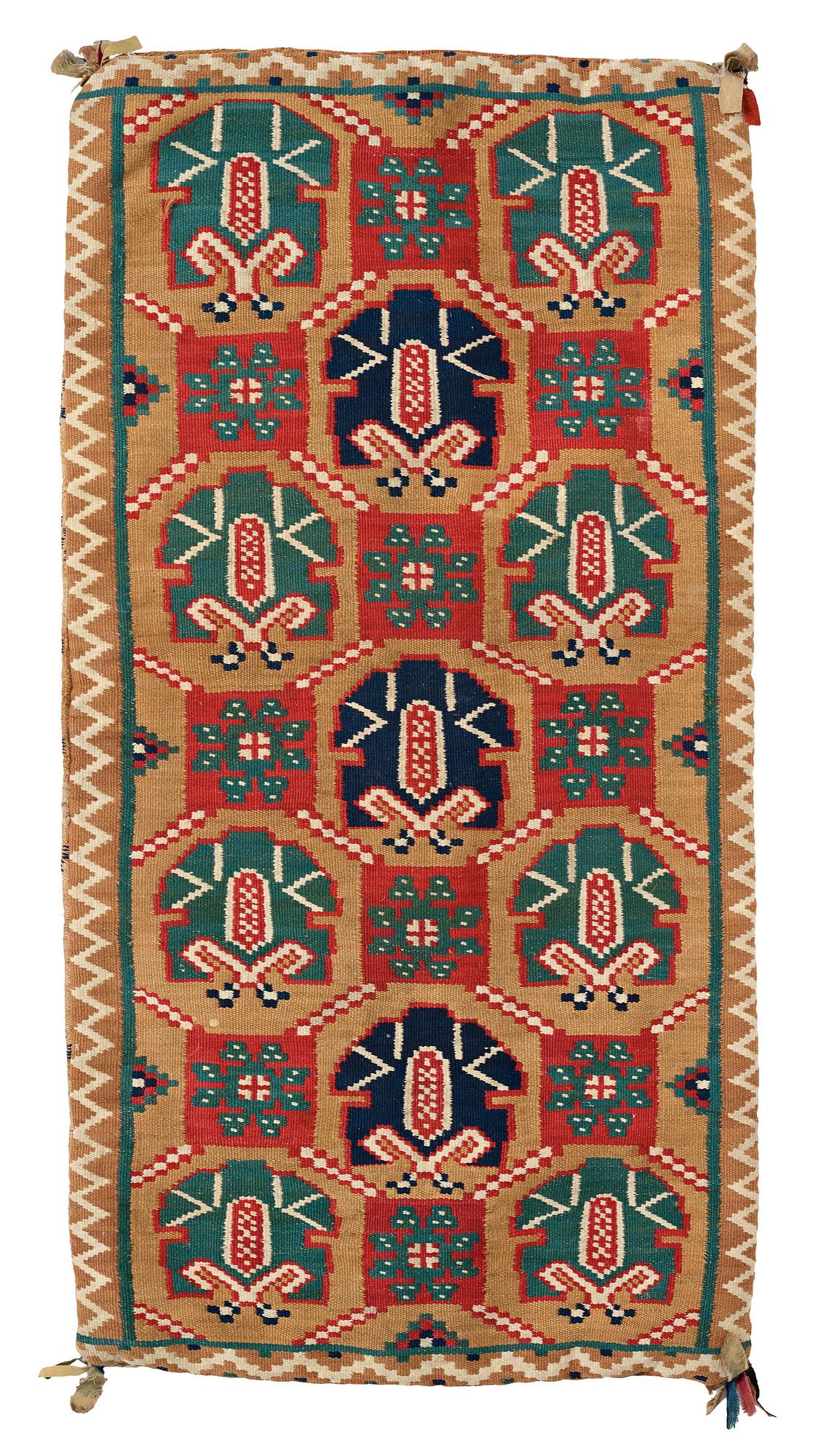 A CARRIAGE CUSHION, "Palmetter och blommor", double interlocked tapestry, ca 105 x 54,5 cm, Scania, Sweden,