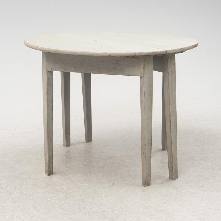 A pair of half circular tables, 19th Century.