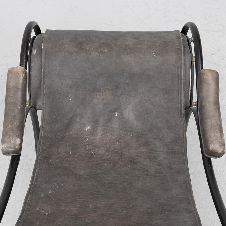 An iron rocking chair, R.W Winfeild & Company, England, late 19th century.