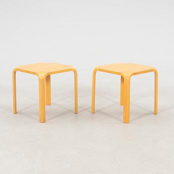 Alvar Aalto, stools/side tables, a pair model X601 Artek, latter half of the 20th century.
