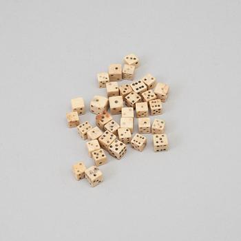 a collection of 34 miniature dice, bone, 19th century.