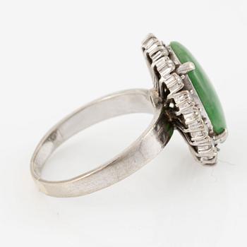 Ring, 14K white gold set with cabochon-cut probably jadeite and small brilliant-cut diamonds.