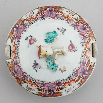 A famille rose butter tureen with cover and two cups with three odd stands, Qing dynasty, Qianlong (1736-95).