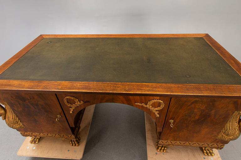 An Empire style mahogany desk 20th century.