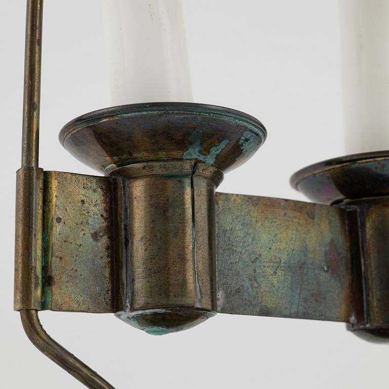 An empire style candlestick, circa 1900.