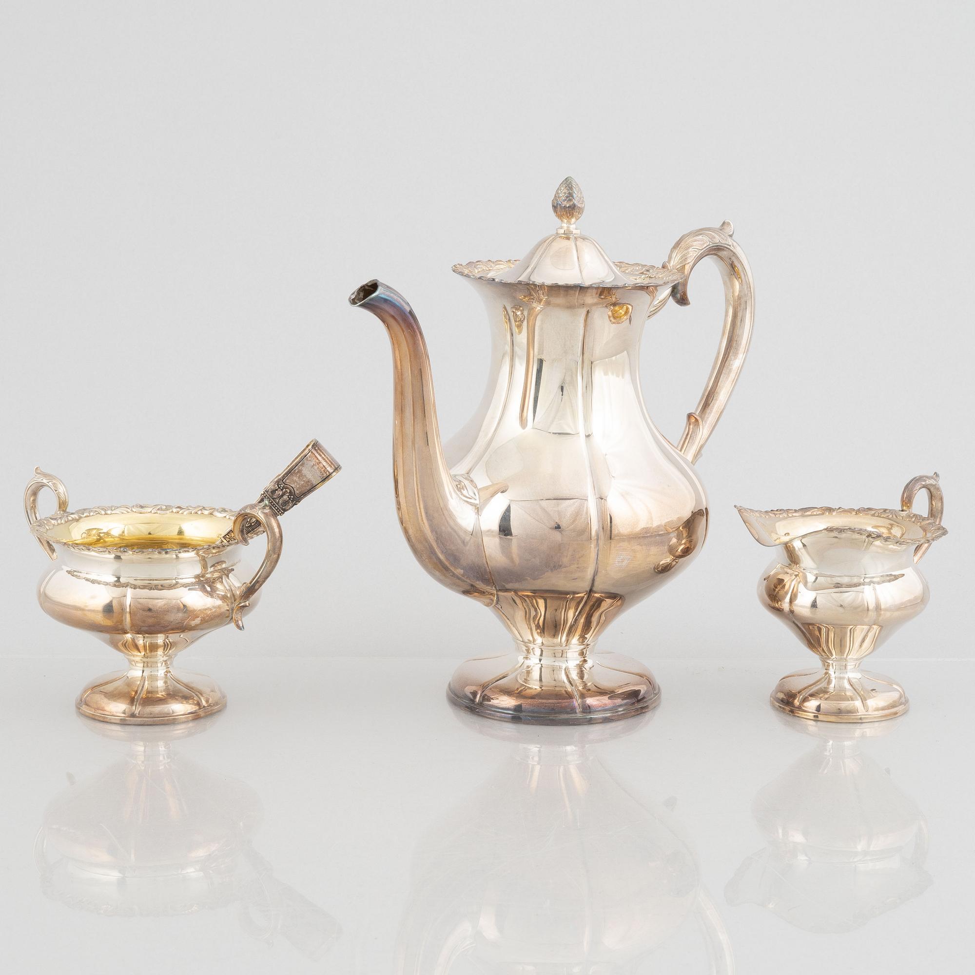 A three-piece Rococo style silver coffee set, Kultakeskus Oy, Tavastehus, Finland, 1973.