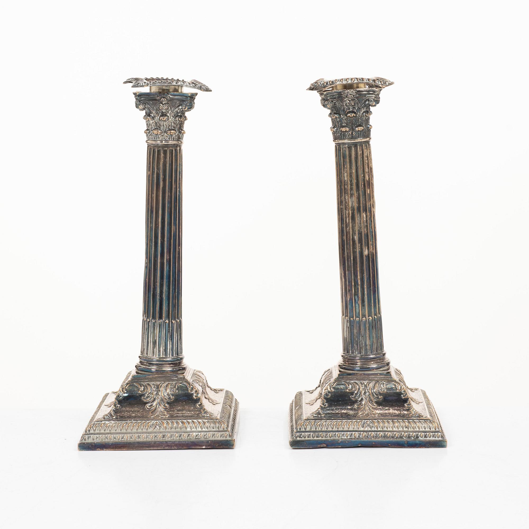 A pair of silver plate candlesticks, no marks, 20th century.