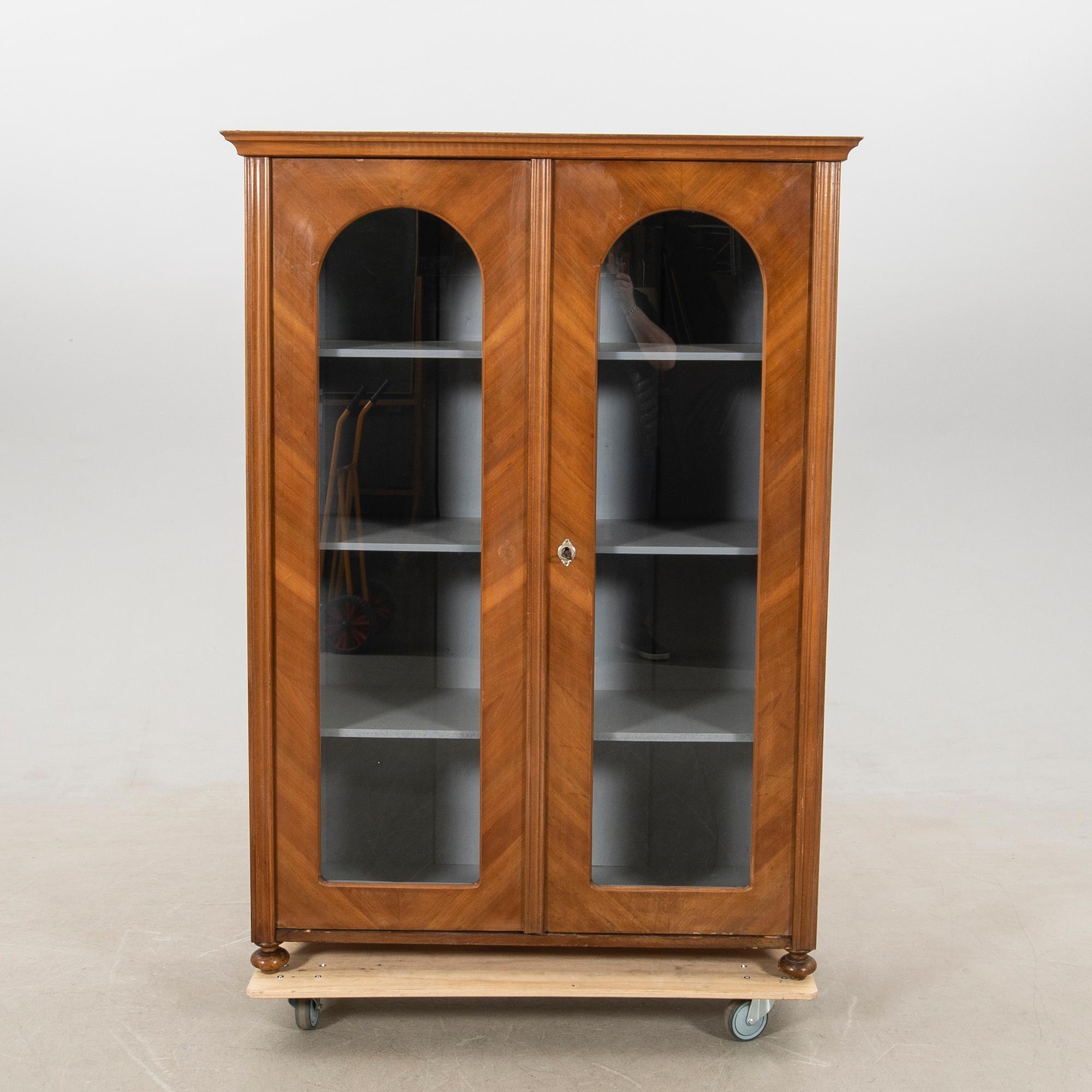 Display cabinet circa 1900.