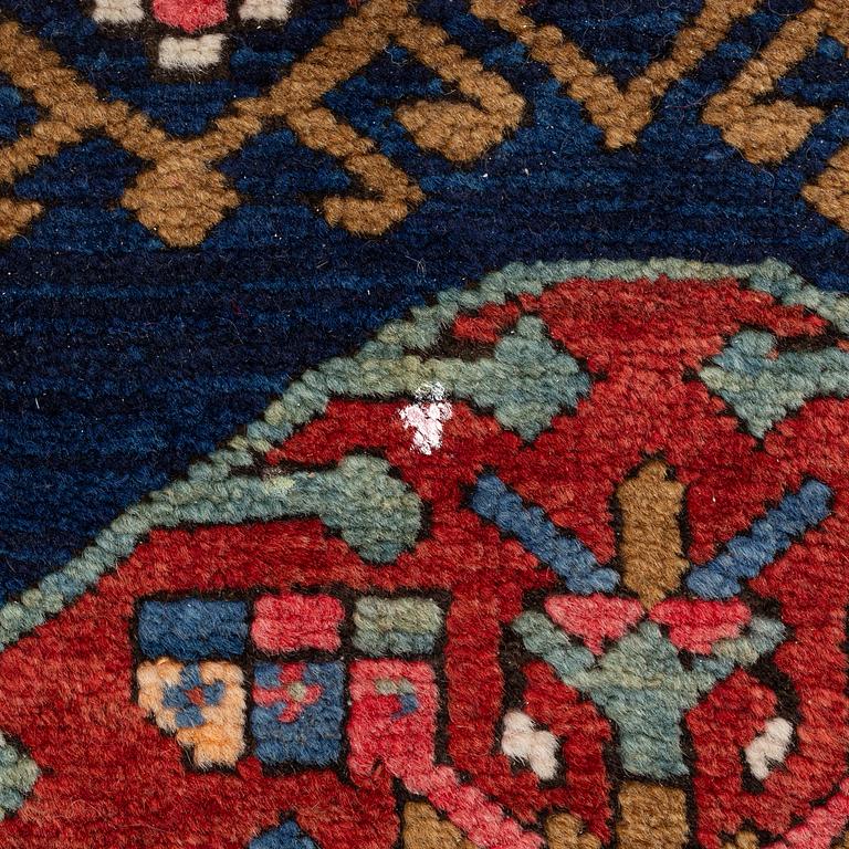 An antique carpet from south caucasus, probably Karabagh, ca 261 x 146 cm.