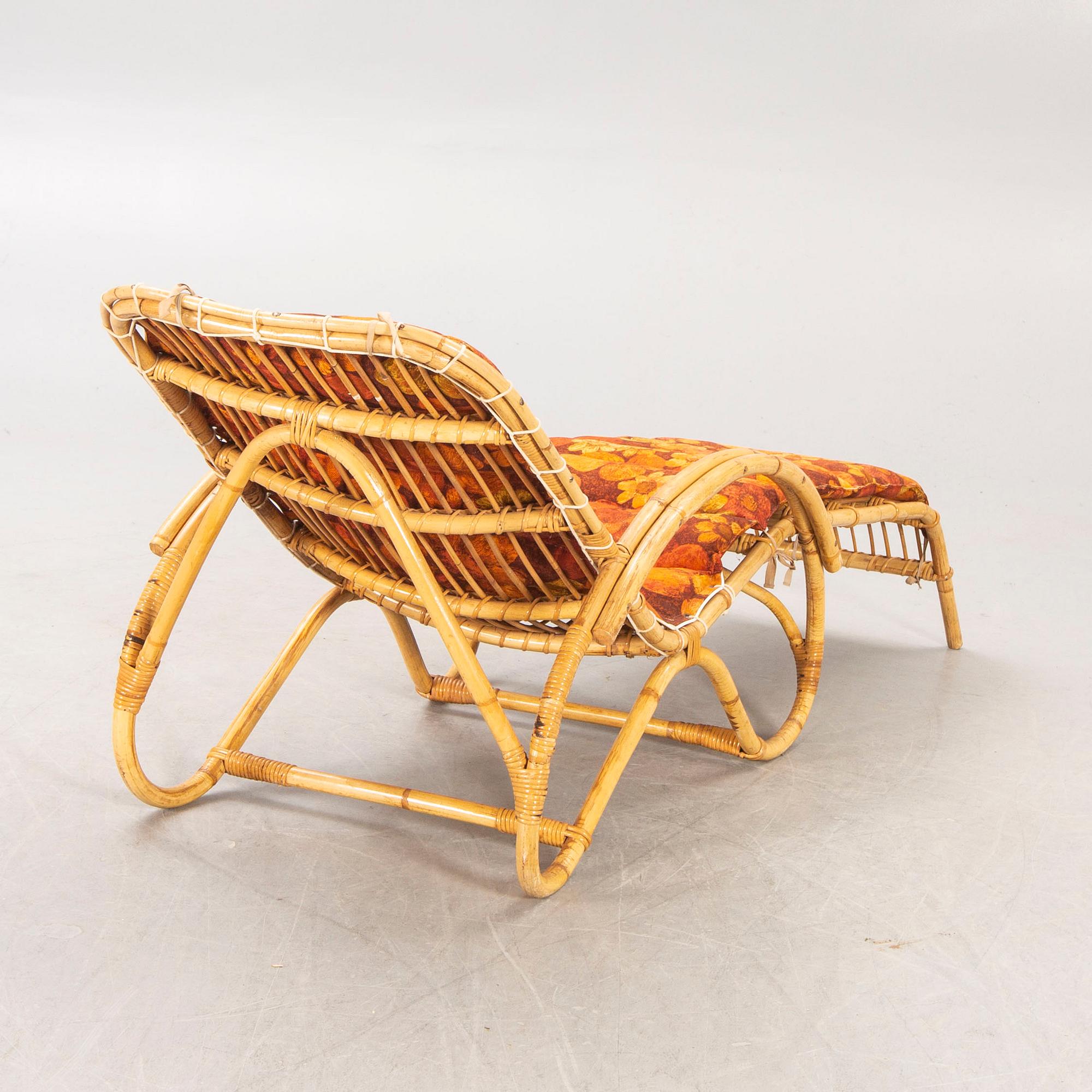 A 1950/60ws bamboo and rattan sun recliner.