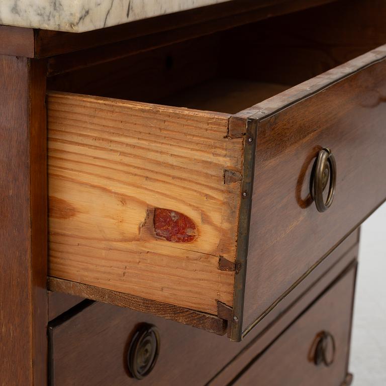 A late gustavian chest of drawers, around 1800.