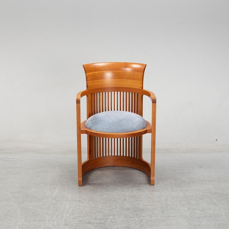 A model 606 'Barrel' chair by Frank Lloyd Wright for Cassina, designed 1937.