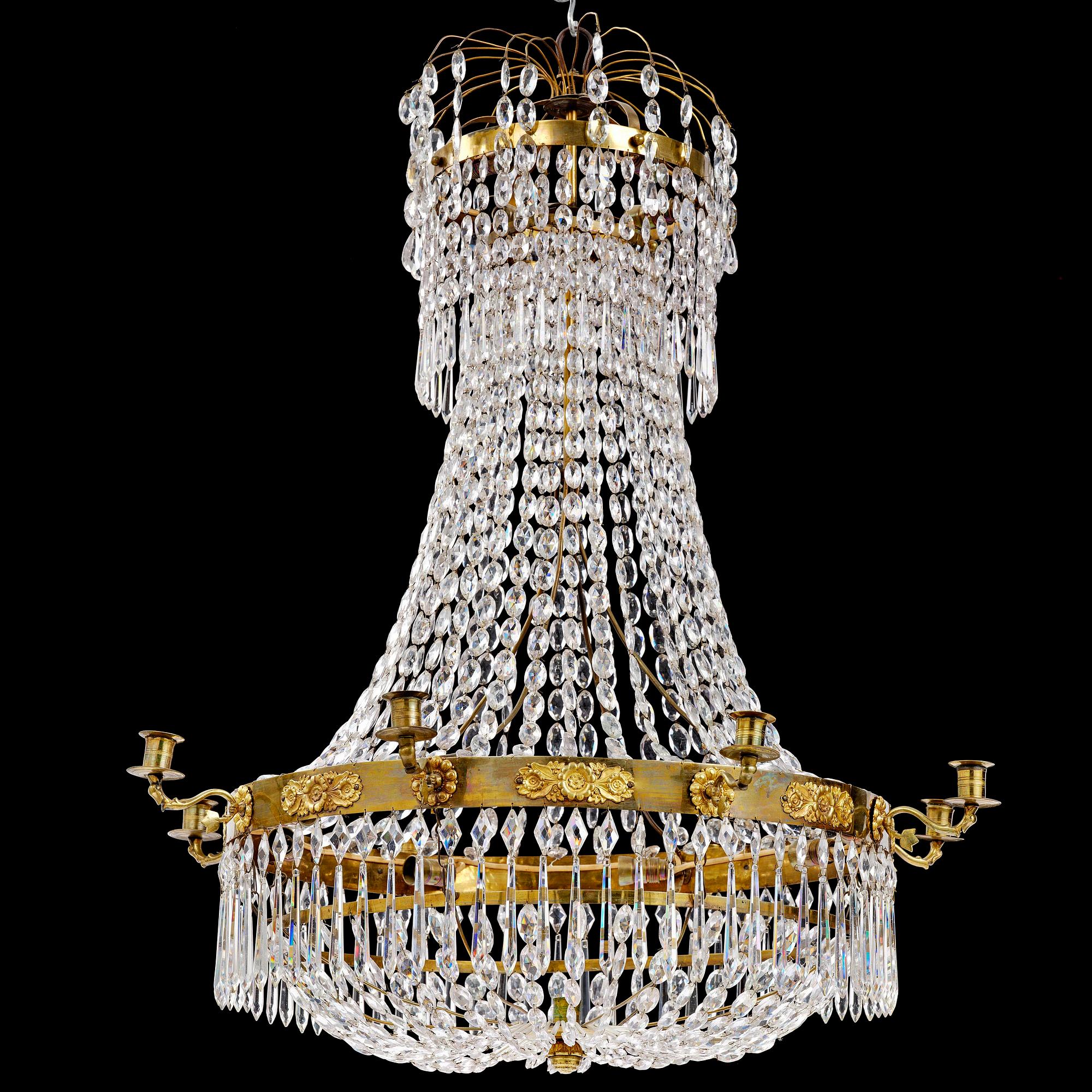 A Swedish late Empire gilt brass nine-light chandelier, 1830's.