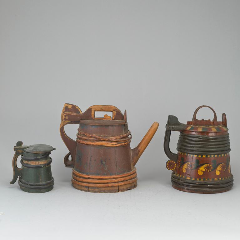 Three painted wooden jars from the 19-20th century.