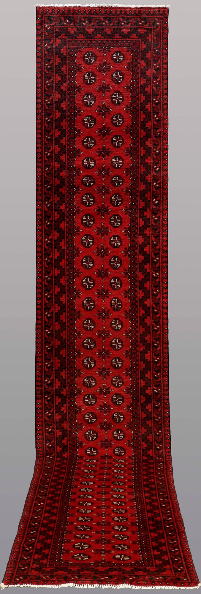 A RUNNER, Afghan, ca 498 x 83 cm.