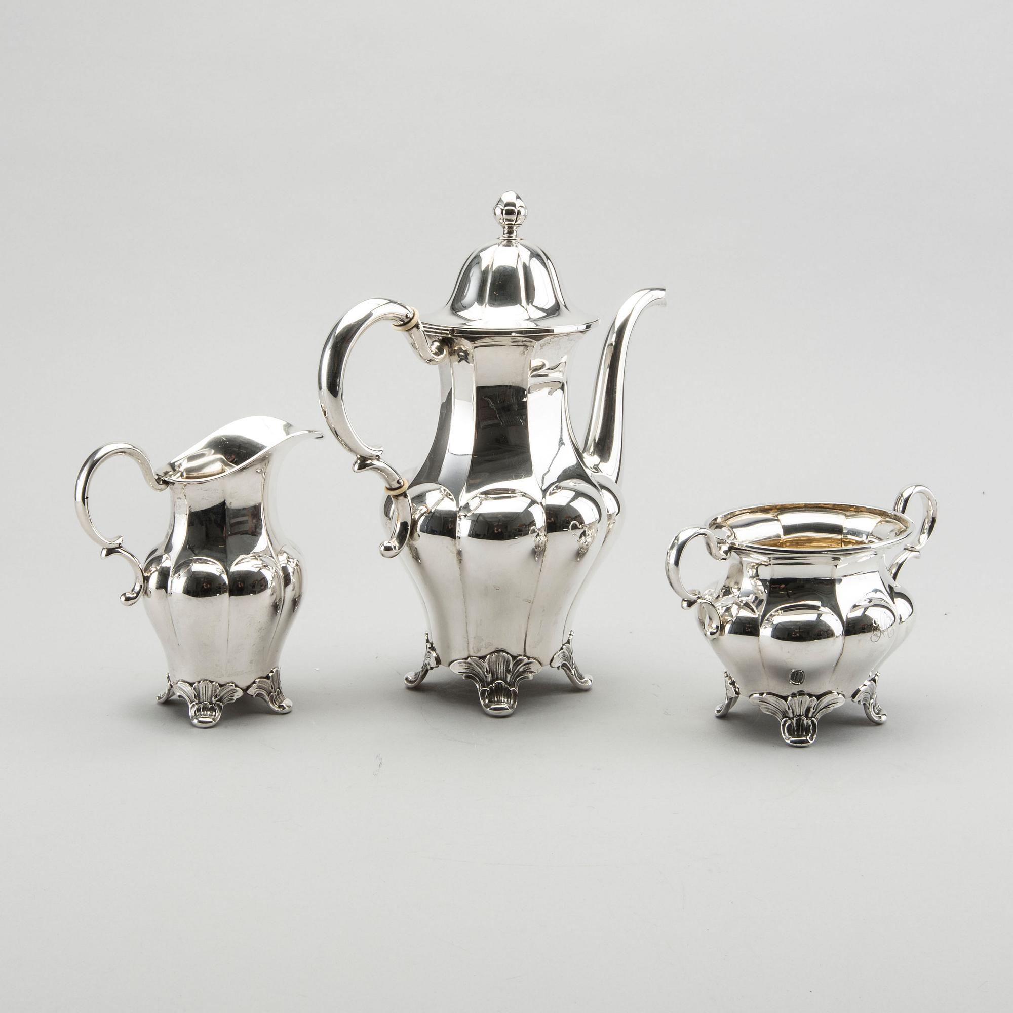 A three piece silver coffee service byGAB AB 1932-33, 1330g.