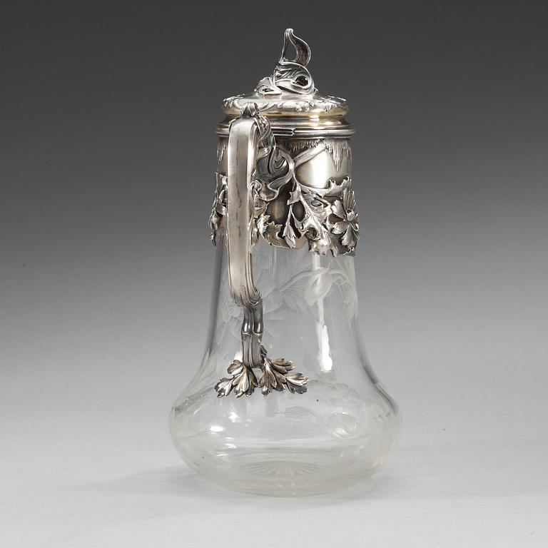 A Russian 20th century glass and parcel- gilt jug.