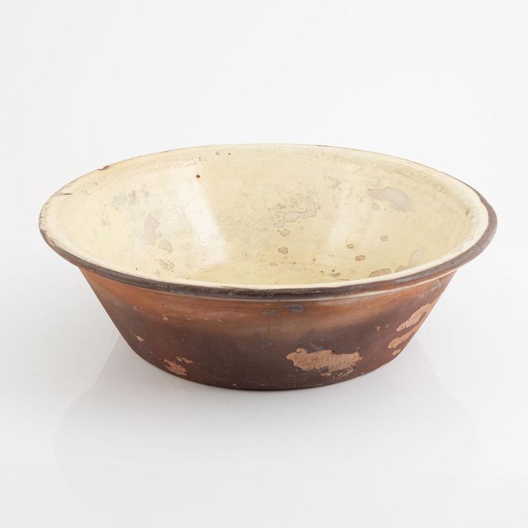 An earthenware washing basin, late 19th century.