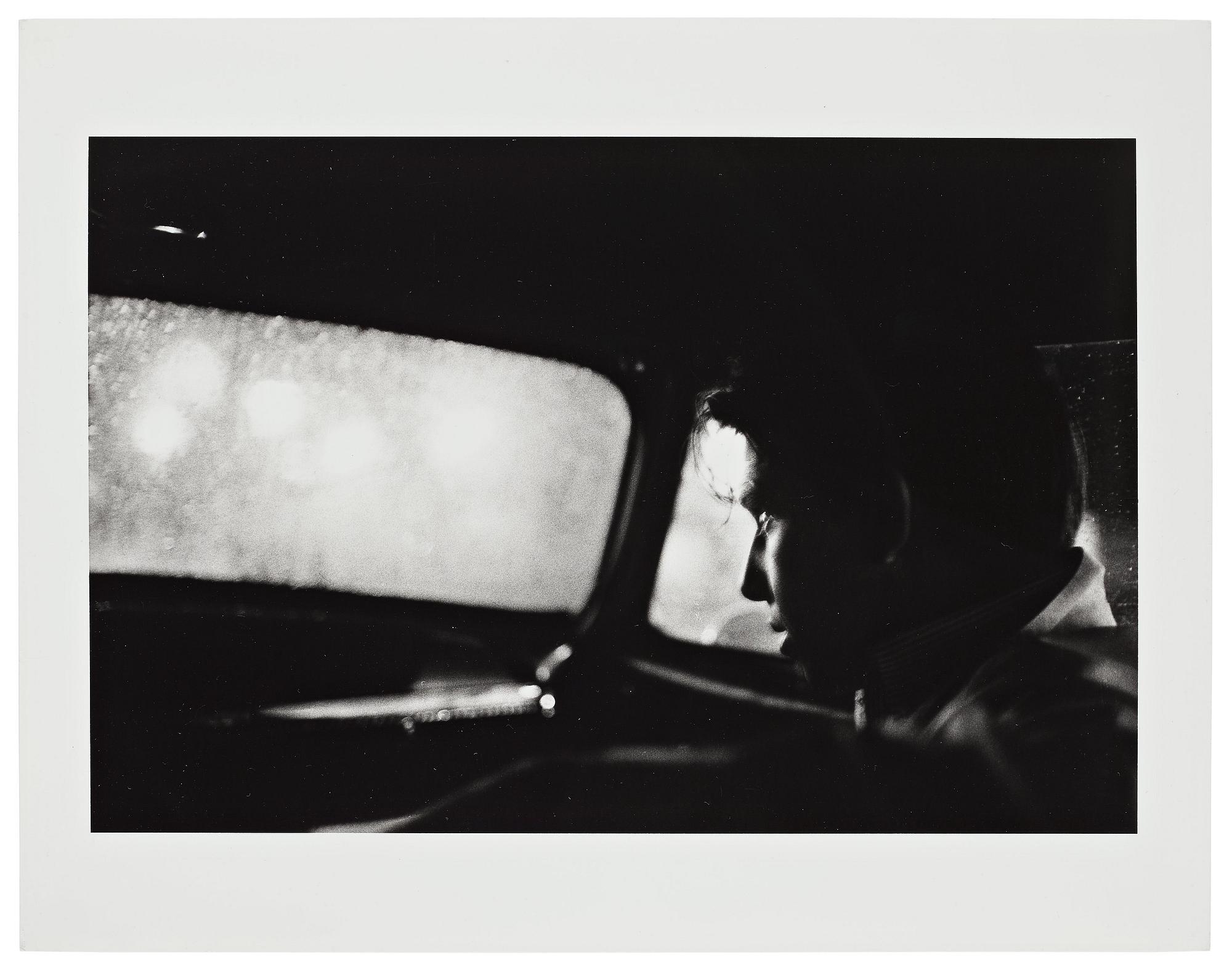 Larry Clark, "Untitled (man in car with view of rainy night)", 1963.