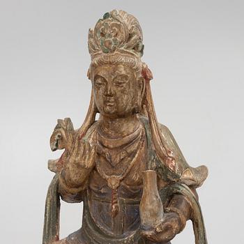 A large Chinese wooden sculpture of Guanyin, late Qing dynasty.