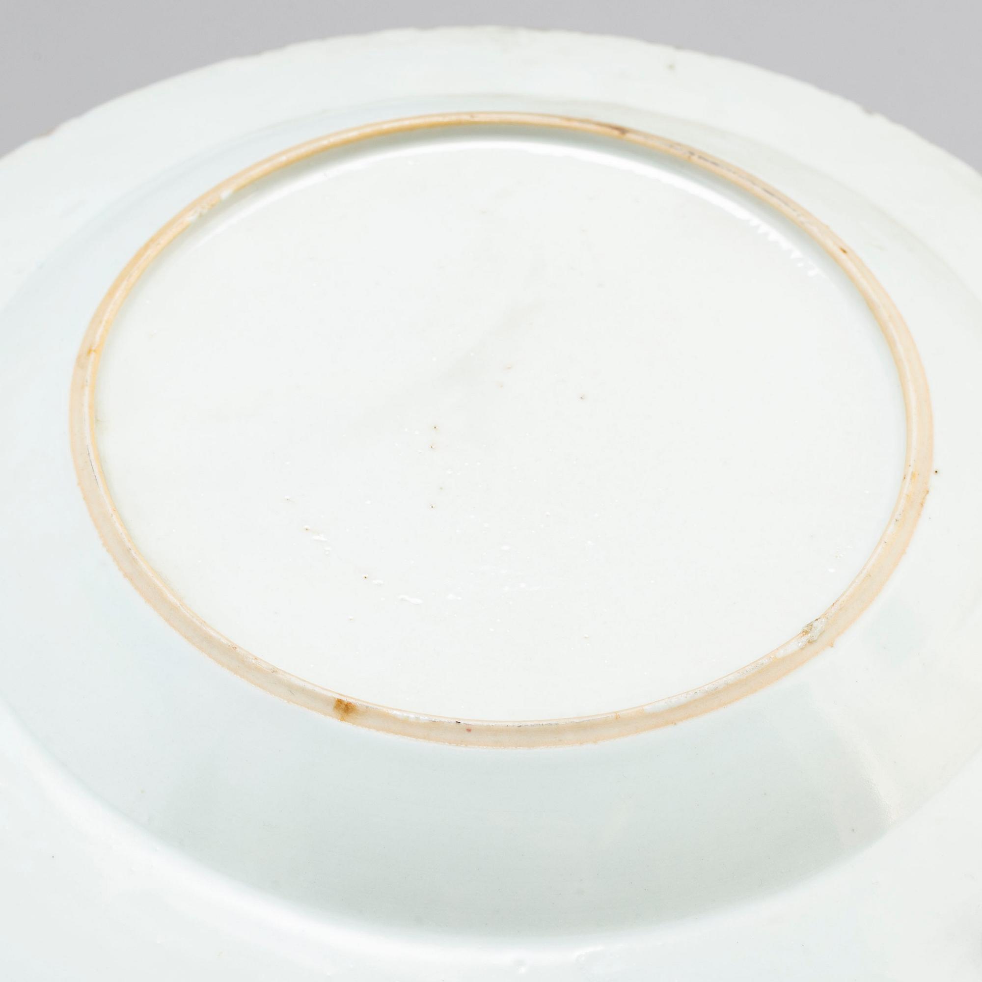 Seven famille rose export porcelain plates and dishes (4+2+1), Qing dynasty, Qianlong (1736-95).