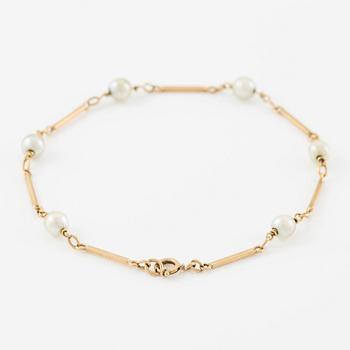 Armband, 18K guld med pärlor.