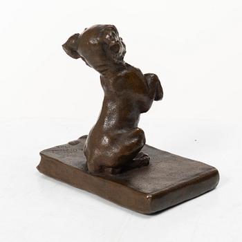 Ferdinand Notini, a bronze sculpture/paper weight, signed, 1908.