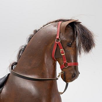 An early 20th century rocking horse.