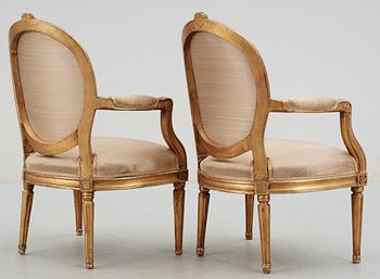 A pair of Gustavian late 18th century armchairs.