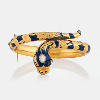 1110. An 18K gold snake bangle decorated with blue enamel and set with an opal and a rose-cut diamond.