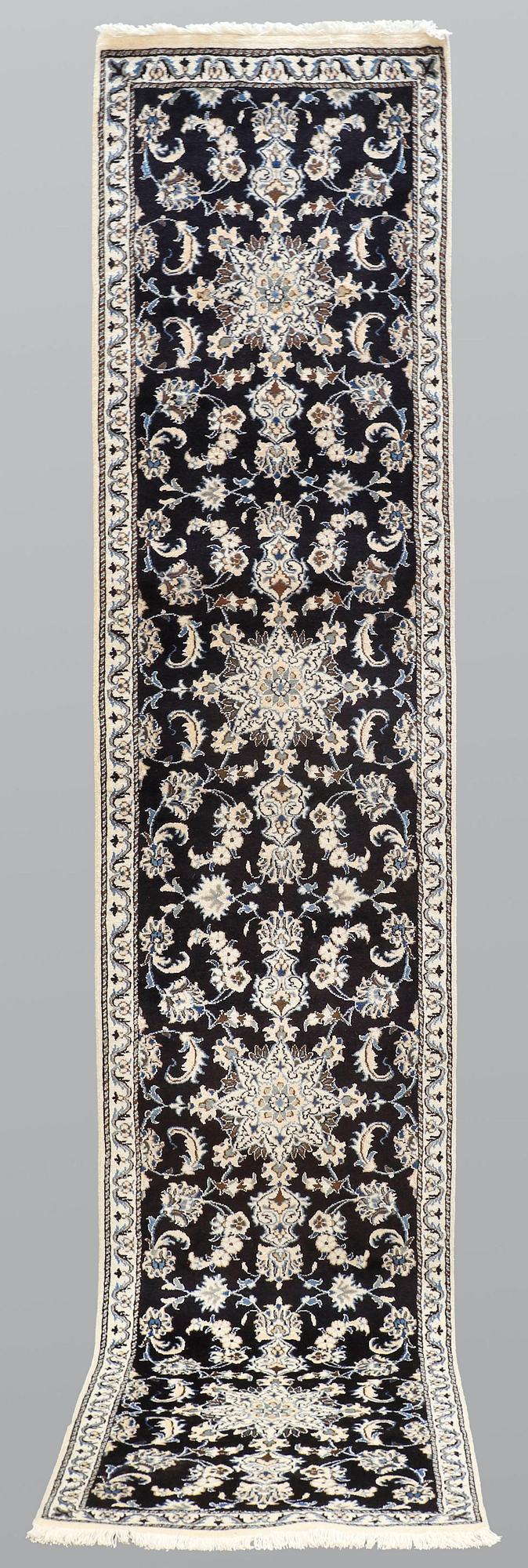 A runner, Nain, part silk, ca 378 x 77 cm.