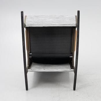 Patricia Urquiola, a "Vieques" rocking chair, Kettal.