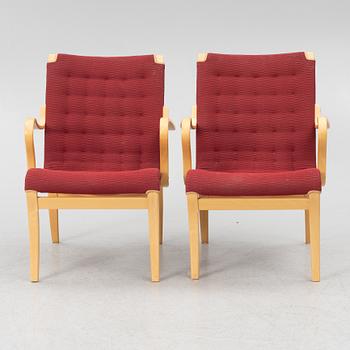 Bruno Mathsson, a pair of "Eva" armchairs, Bruno Mathsson International, second half of the 20th century.