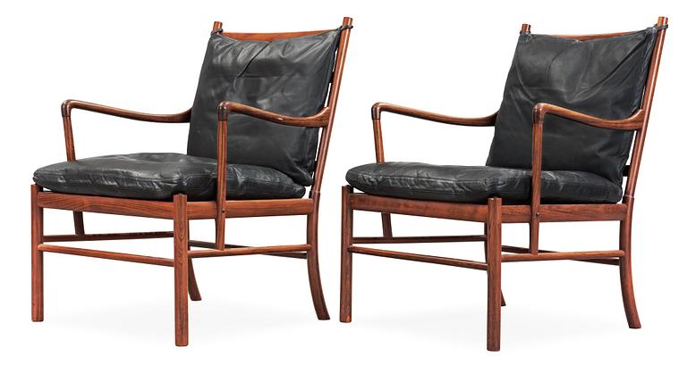 A pair of Ole Wanscher palisander and black leather 'Colonial Chairs, PJ 149', Poul Jeppesen, Denmark.