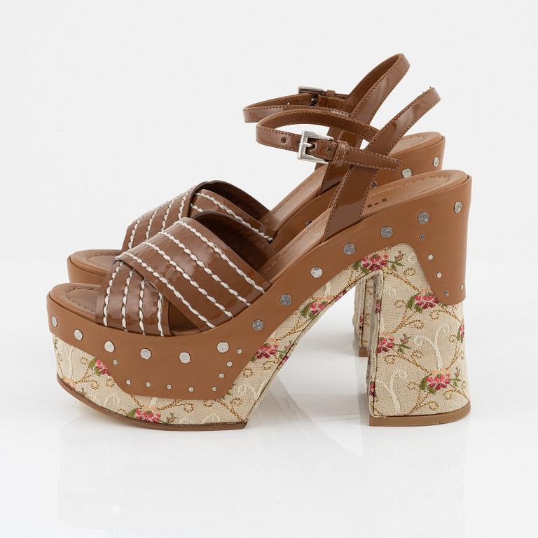 Prada, a pair of embroidered textile and leather sandals, size 37.