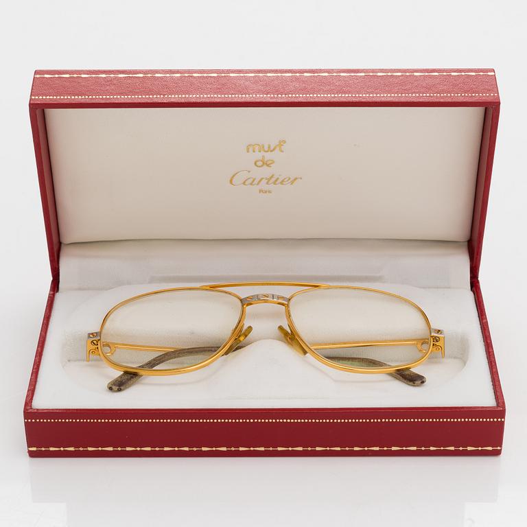 must de Cartier, Santos, Glasögonbågar. Märkta Cartier, Paris, Made in France 135, 54, 16.