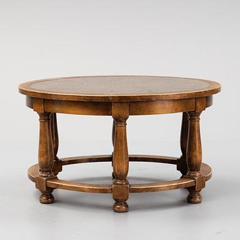 A stone top coffee table. First half of the 20th Century.