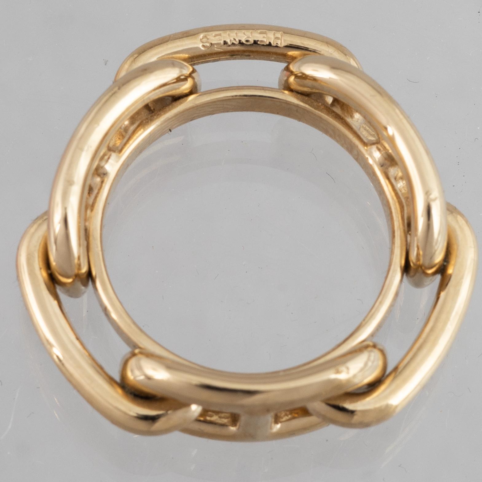 Hermès, a scarf ring.