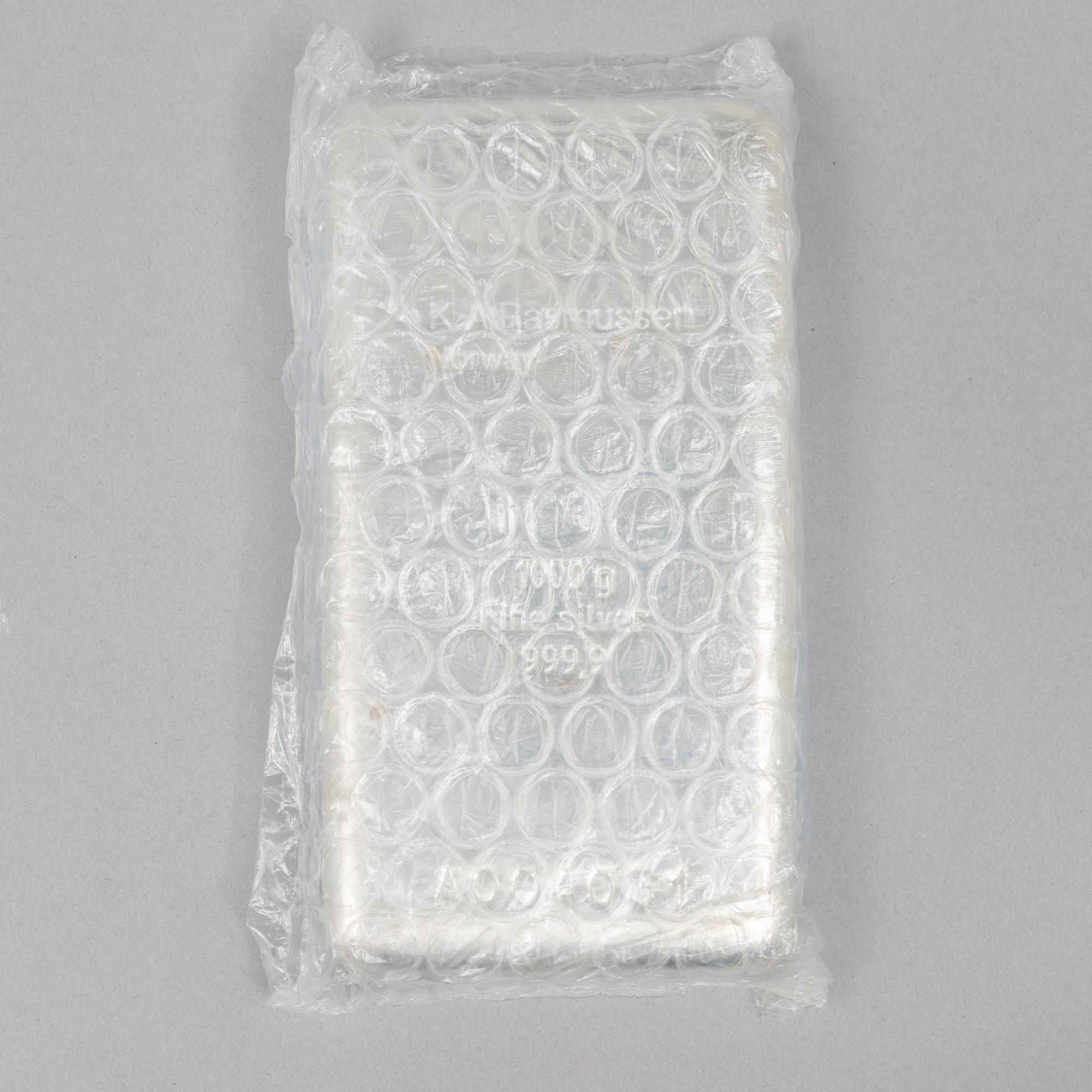 Silvertacka, 1000 gram finsilver, K.A. Rasmussen, Norge.