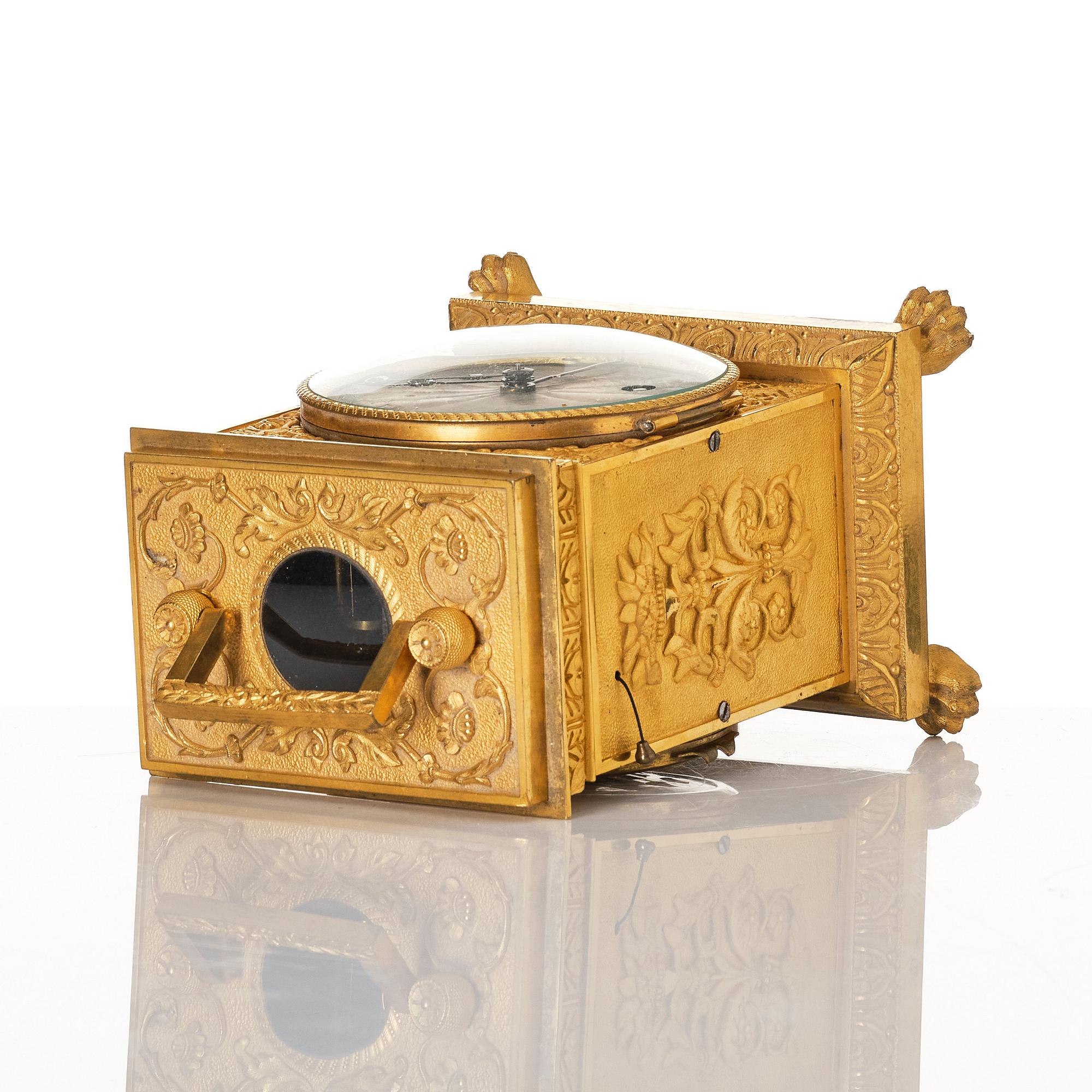 A late empire mantel clock, mid 19th century.