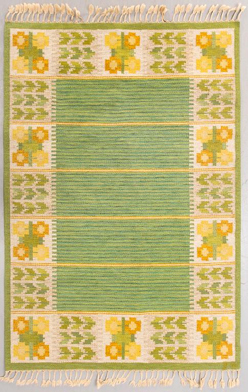 Berit Woelfer, a signed flat weave carpet 232x169 cm.