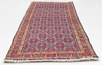 A oriental rug, c. 295 x 108 cm.