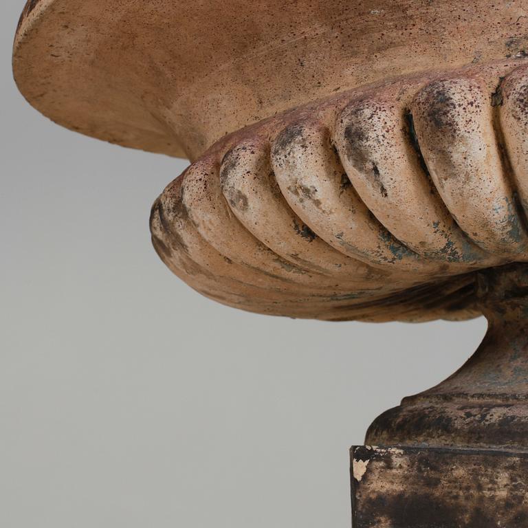 A pair of English 19th century stoneware garden urns.