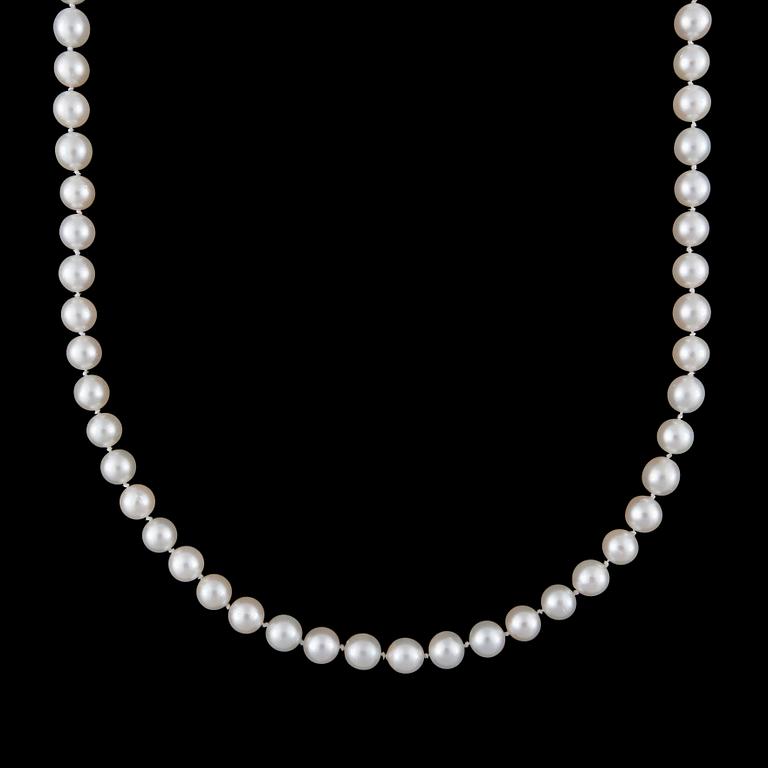 A cultured saltwater pearl, circa 8mm, necklace. Clasp designed as two eggs set with sapphires and diamonds.