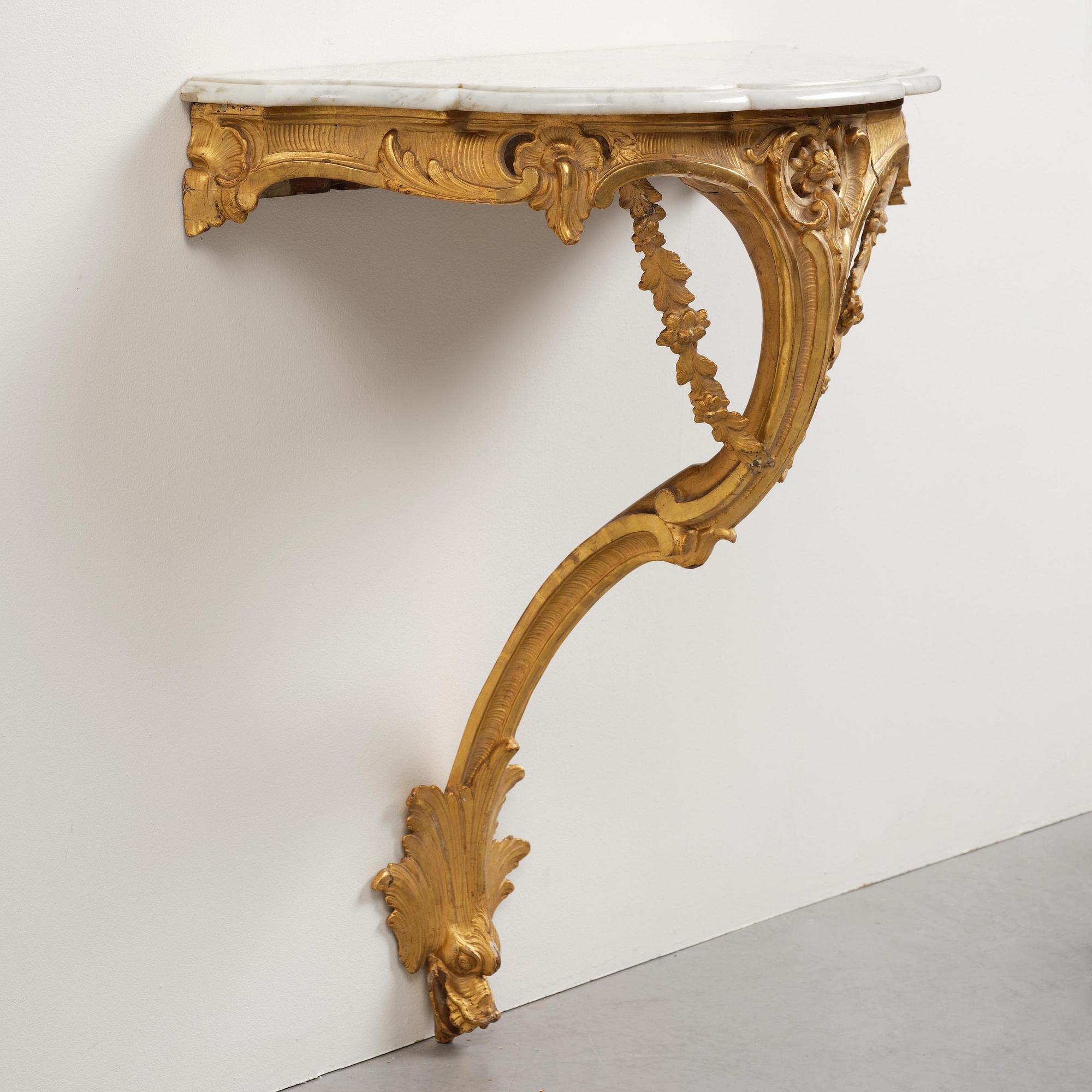 A rococo giltwood and marble console table, Stockholm, later part 18th century.