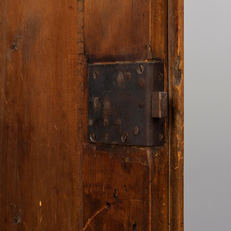 A traditional painted swedish cabinet dated 1744.