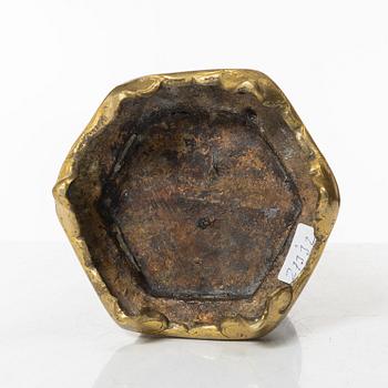 A silvered brass prayer container, Tibet, 20th century.