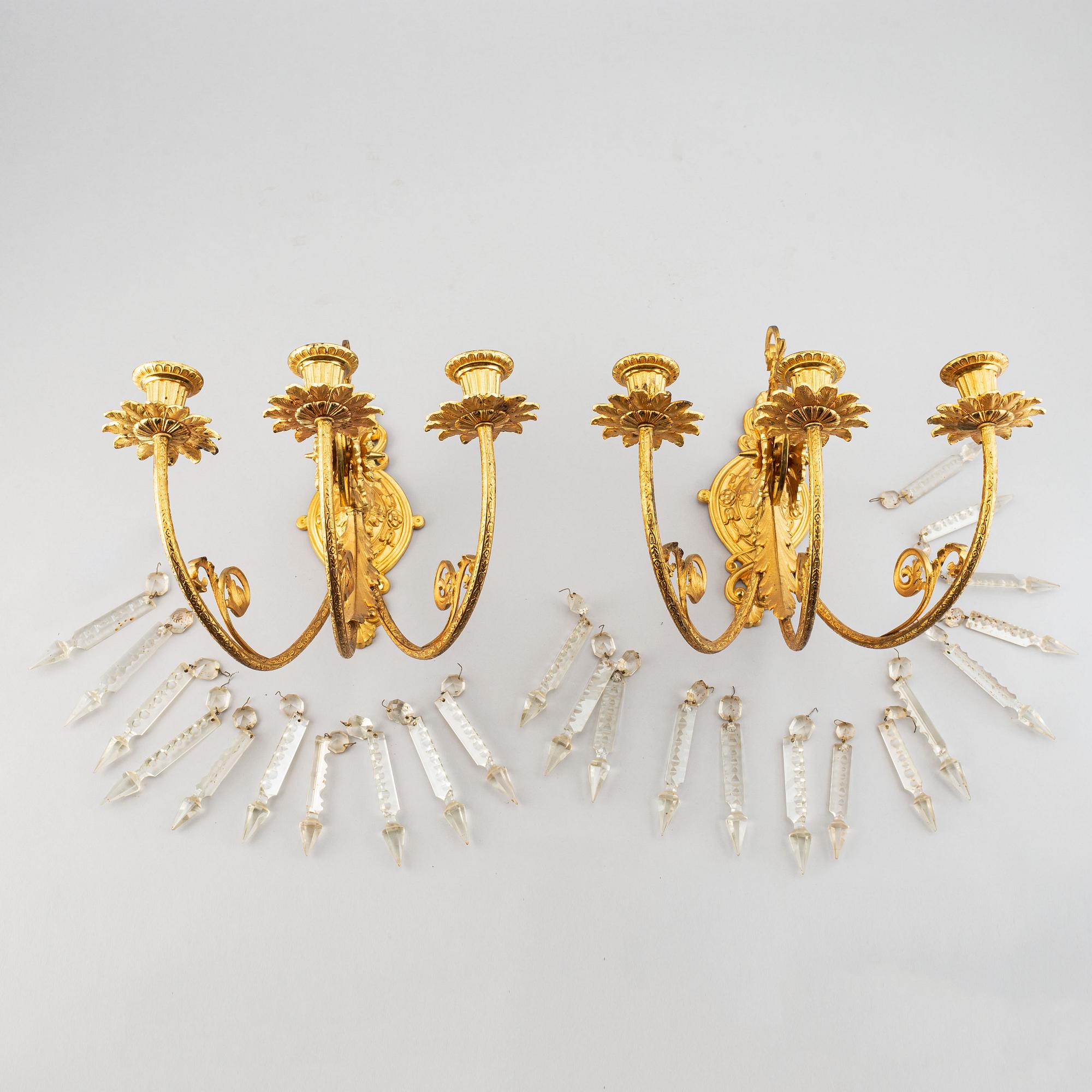 A pair of wall sconces from the late 19th century.